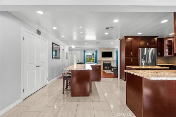 Fireplace, Interior, Kitchen, Recessed Lighting, Stainless Steel Appliances