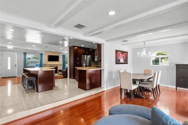 Chandelier, Dining room, Interior, Kitchen, Recessed Lighting, Stainless Steel Appliances, Wood Texture Flooring