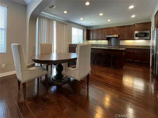 Dining room, Interior, Kitchen, Recessed Lighting, Stainless Steel Appliances, Wood Texture Flooring