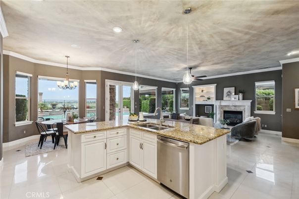 Chandelier, Dining room, Fireplace, Interior, Kitchen, Living room, Pendant Lights, Recessed Lighting, Water