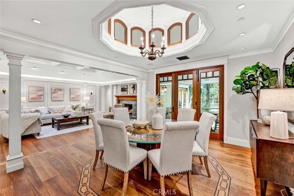 Chandelier, Dining room, Fireplace, Interior, Living room, Recessed Lighting, Wood Texture Flooring