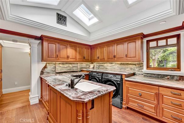 Interior, Kitchen, Recessed Lighting, Washer, Wood Texture Flooring