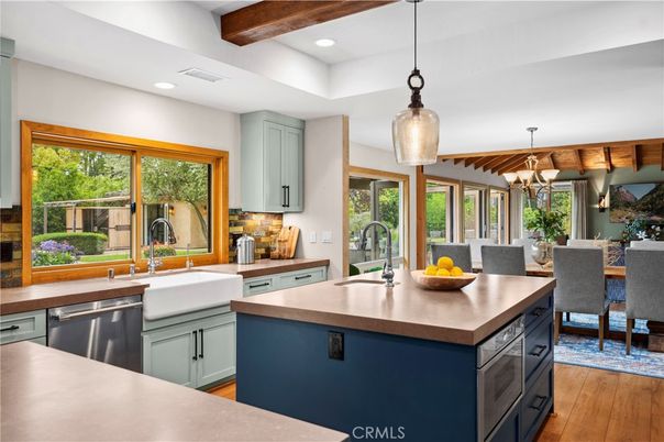 Chandelier, Dining room, Interior, Kitchen, Pendant Lights, Recessed Lighting, Stainless Steel Appliances, Wooden Beams, Wood Texture Flooring