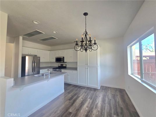 Chandelier, Interior, Kitchen, Recessed Lighting, Stainless Steel Appliances, Wood Texture Flooring