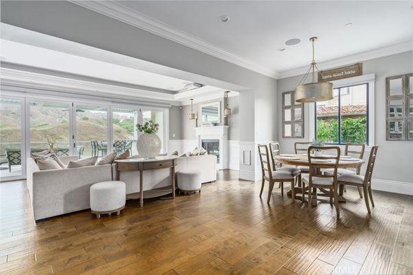 Dining room, Fireplace, Interior, Living room, Pendant Lights, Recessed Lighting, Wood Texture Flooring