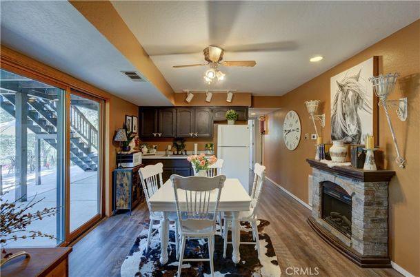 Dining room, Fireplace, Interior, Kitchen, Recessed Lighting, Wood Texture Flooring