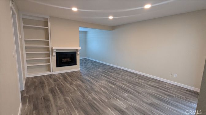 Empty room, Fireplace, Interior, Recessed Lighting, Wood Texture Flooring