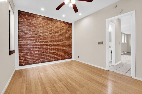 Empty room, Interior, Recessed Lighting, Stone Walls, Wood Texture Flooring