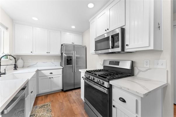Interior, Kitchen, Recessed Lighting, Stainless Steel Appliances, Wood Texture Flooring