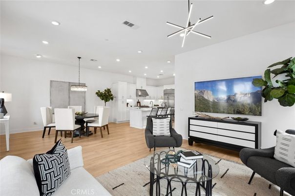 Dining room, Interior, Kitchen, Living room, Pendant Lights, Recessed Lighting, Stainless Steel Appliances, Wood Texture Flooring