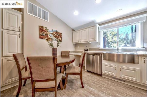 Dining room, Interior, Kitchen, Recessed Lighting, Stainless Steel Appliances, Wood Texture Flooring