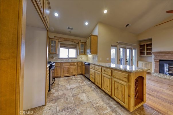 Fireplace, Interior, Kitchen, Recessed Lighting, Stainless Steel Appliances