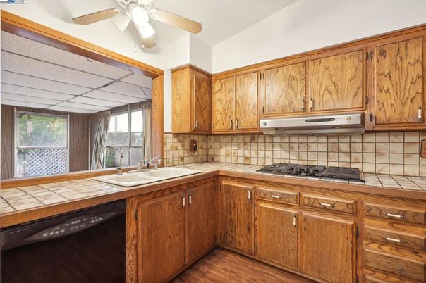 Interior, Kitchen, Tile Countertops, Wood Texture Flooring