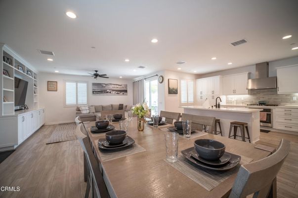 Dining room, Interior, Kitchen, Living room, Recessed Lighting, Stainless Steel Appliances, Wood Texture Flooring
