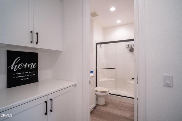 Bathroom, Glass Shower, Interior, Recessed Lighting, Wood Texture Flooring