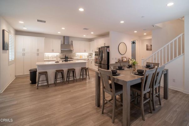 Dining room, Interior, Kitchen, Recessed Lighting, Stainless Steel Appliances, Wood Texture Flooring