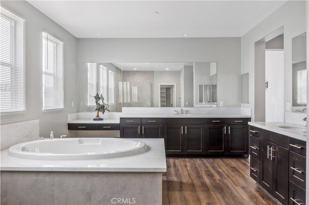 Bathroom, Dual Sink Vanities, Interior, Recessed Lighting, Wood Texture Flooring