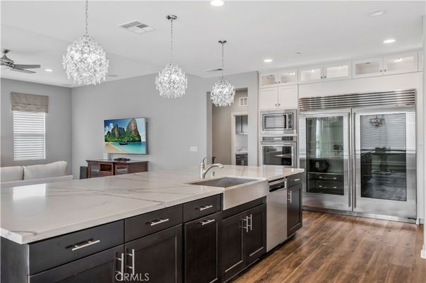 Chandelier, Interior, Kitchen, Pendant Lights, Recessed Lighting, Stainless Steel Appliances, Wood Texture Flooring