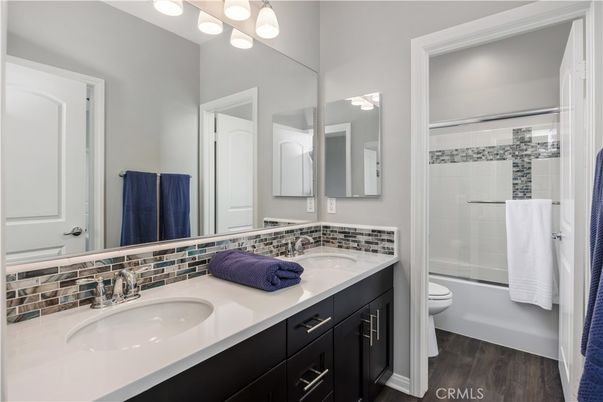 Bathroom, Dual Sink Vanities, Glass Shower, Interior, Wood Texture Flooring