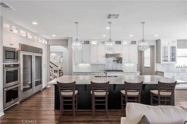 Chandelier, Interior, Kitchen, Pendant Lights, Recessed Lighting, Stainless Steel Appliances, Wood Texture Flooring