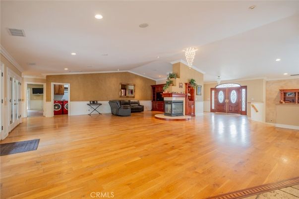 Chandelier, Fireplace, Interior, Recessed Lighting, Wood Texture Flooring