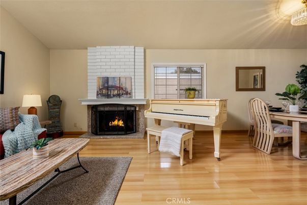 Dining room, Fireplace, Interior, Living room, Piano, Stone Walls, Wood Texture Flooring