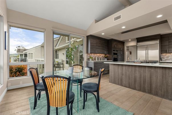 Dining room, Interior, Kitchen, Recessed Lighting, Stainless Steel Appliances, Wood Texture Flooring
