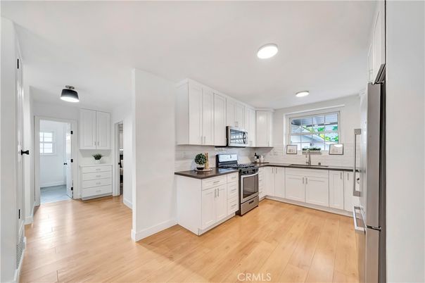 Interior, Kitchen, Recessed Lighting, Stainless Steel Appliances, Wood Texture Flooring