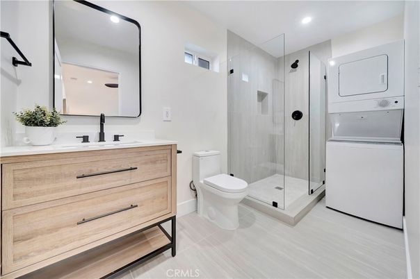 Bathroom, Dual Sink Vanities, Glass Shower, Interior, Recessed Lighting, Washer