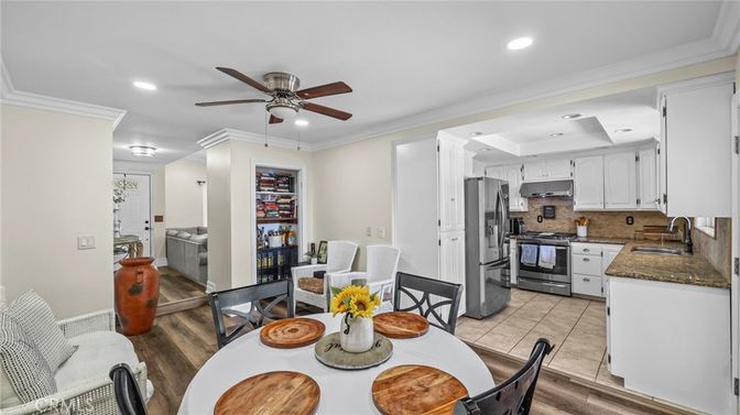 Dining room, Interior, Kitchen, Recessed Lighting, Stainless Steel Appliances, Wood Texture Flooring