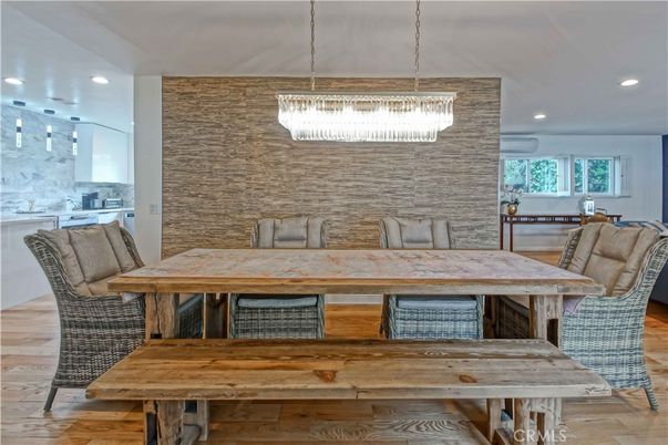 Chandelier, Dining room, Interior, Pendant Lights, Recessed Lighting, Stone Walls, Wood Texture Flooring
