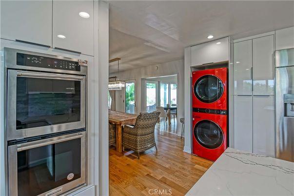 Interior, Kitchen, Pendant Lights, Recessed Lighting, Stainless Steel Appliances, Washer, Wood Texture Flooring