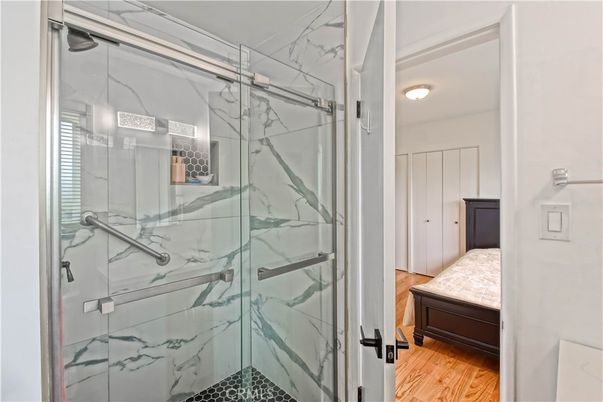 Bathroom, Bedroom, Glass Shower, Interior, Marble Walls, Wood Texture Flooring