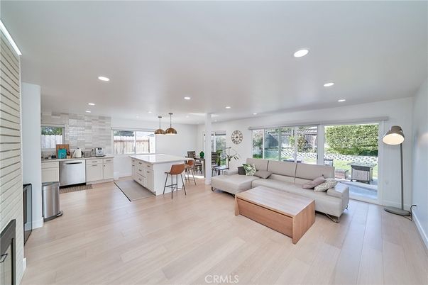 Interior, Kitchen, Living room, Pendant Lights, Recessed Lighting, Stainless Steel Appliances, Stone Walls, Wood Texture Flooring
