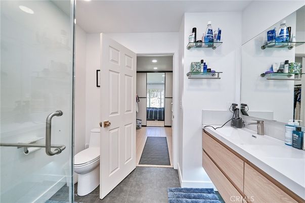 Bathroom, Glass Shower, Interior, Recessed Lighting, Wood Texture Flooring