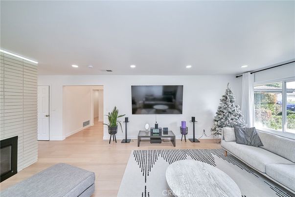 Fireplace, Interior, Living room, Recessed Lighting, Wood Texture Flooring