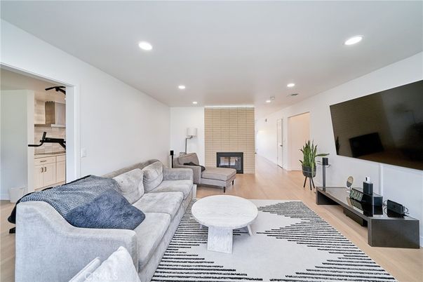Fireplace, Interior, Living room, Recessed Lighting, Wood Texture Flooring