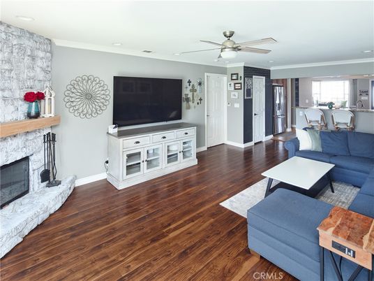 Dining room, Fireplace, Interior, Living room, Recessed Lighting, Wood Texture Flooring