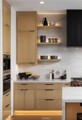 Interior, Kitchen, Marble Walls, Recessed Lighting, Stainless Steel Appliances