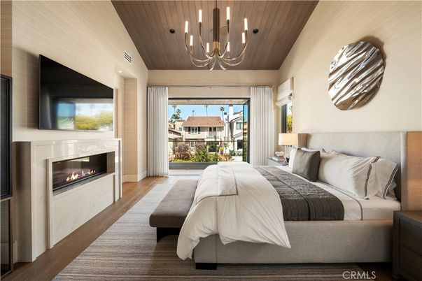 Bedroom, Chandelier, Fireplace, Interior, Recessed Lighting, Wooden Ceilings, Wood Texture Flooring