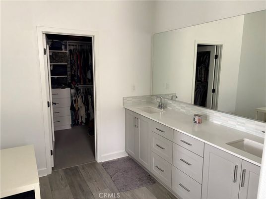 Bathroom, Dual Sink Vanities, Interior, Walk-in Closets, Wood Texture Flooring