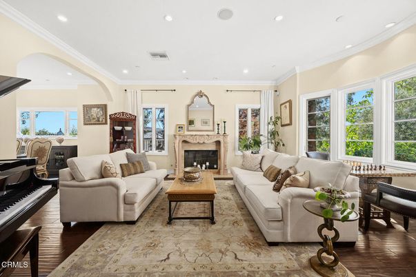 Fireplace, Interior, Living room, Piano, Recessed Lighting, Wood Texture Flooring