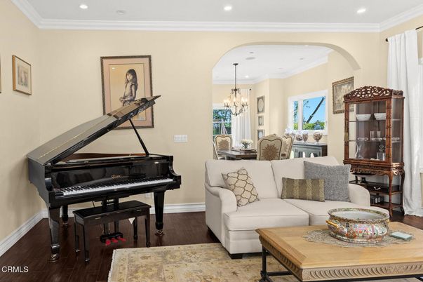 Chandelier, Dining room, Interior, Living room, Piano, Recessed Lighting, Wood Texture Flooring