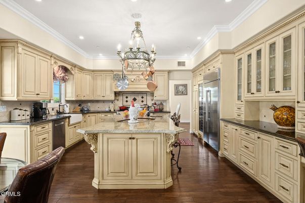 Chandelier, Interior, Kitchen, Recessed Lighting, Stainless Steel Appliances, Wood Texture Flooring