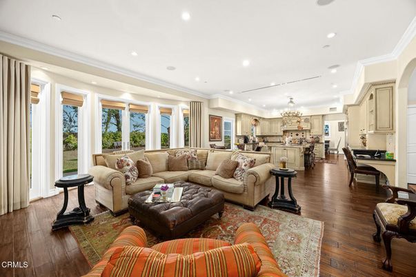Chandelier, Interior, Kitchen, Living room, Recessed Lighting, Stainless Steel Appliances, Wood Texture Flooring