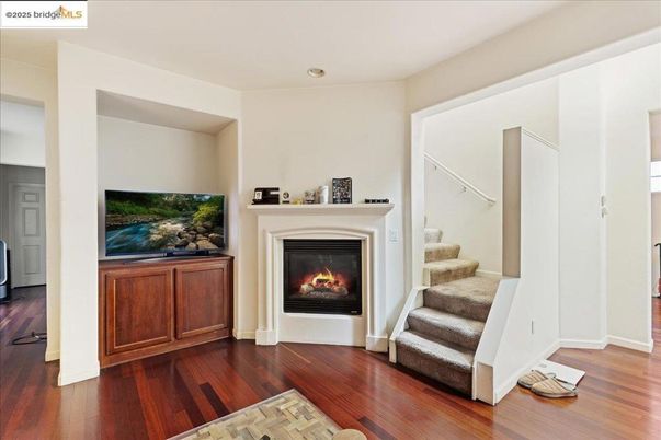 Fireplace, Interior, Recessed Lighting, Wood Texture Flooring