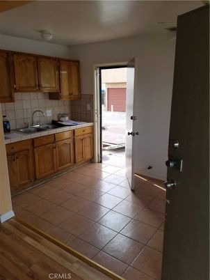 Interior, Kitchen, Tile Countertops, Wood Texture Flooring