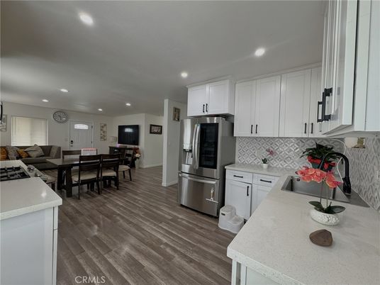 Dining room, Interior, Kitchen, Recessed Lighting, Stainless Steel Appliances, Wood Texture Flooring