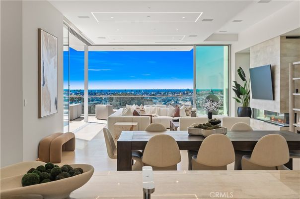 Dining room, Fireplace, Interior, Living room, Recessed Lighting, Water, Wood Texture Flooring