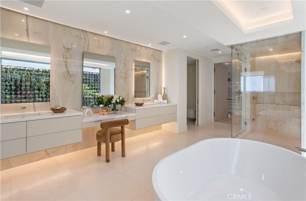 Bathroom, Dual Sink Vanities, Free Standing Baths, Glass Shower, Interior, Marble Walls, Recessed Lighting